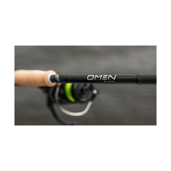 Black | 13 Fishing Omen Black 6'6 Spin Rod Image Showing View Of Logo, With Spin Reel Attached (Not Included).