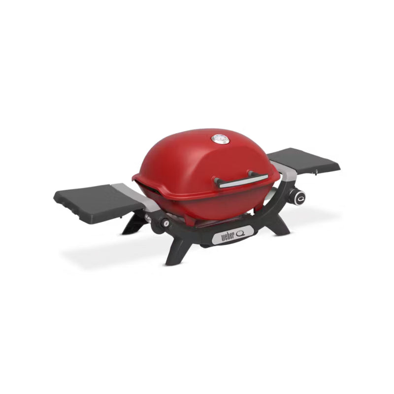 Flame Red | Weber Baby Q (1200N) Premium Barbecue. Angled Front View With Side Tables Out - Lid Closed.