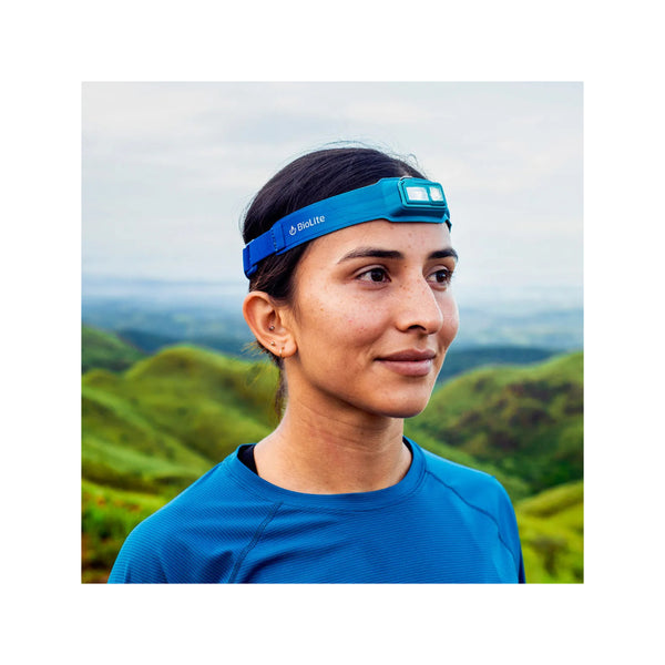 Teal / Navy | BioLite Rechargeable 425 Lumens Headlamp Image Showing The Headlamp On A Model.