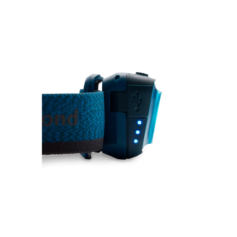 Azul | Black Diamond Cosmo R Headlamp 350 Lumens - Rechargeable Image Showing Side View, With Charger Port And Battery Power Indicator Lit Up.