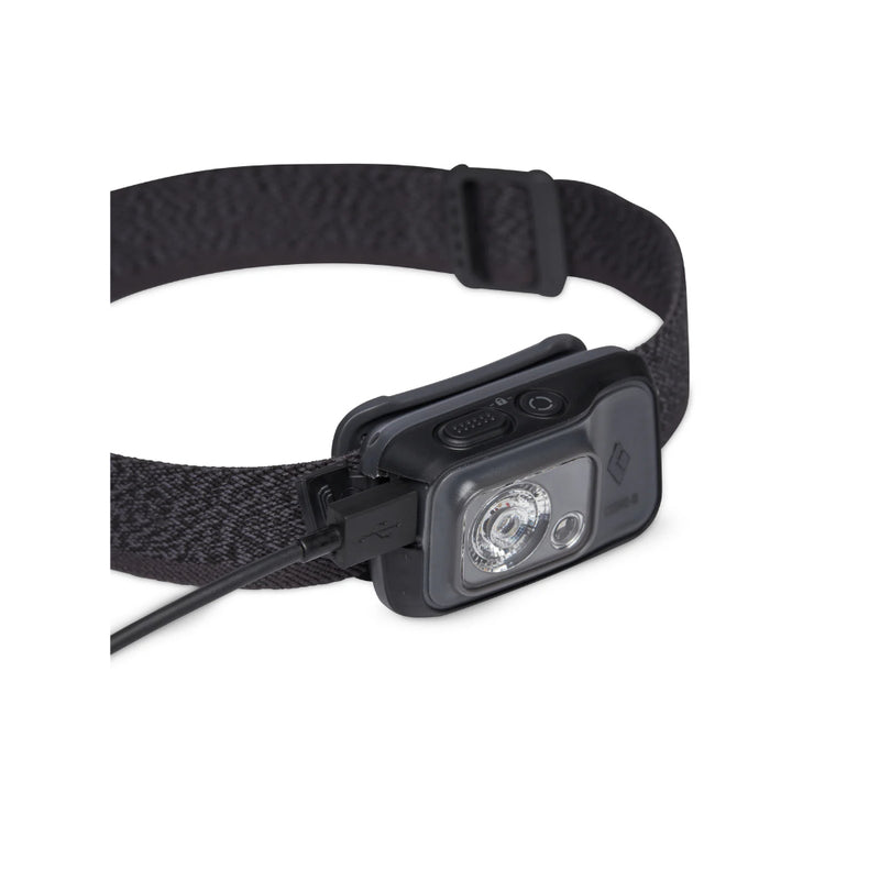 Graphite |  Black Diamond Cosmo R Headlamp 350 Lumens Rechargeable Image Showing Close Up View Of Recharge Port With Cord In.