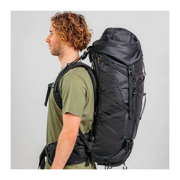 Jet Black | Black Wolf Falcon Trekking Pack. Side View On Model.