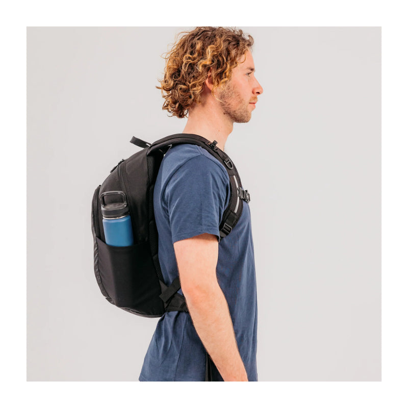 Black | Black Wolf Trace II 16L Day Pack. Side View Showing Water Bottle in Holder. 