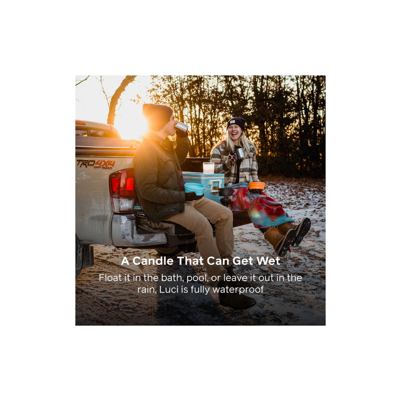 Cool White LEDs | BioLite Luci Inflatable Lantern Candle Image Showing Lantern Candle Being Use In A Ute Bed While Out Camping.