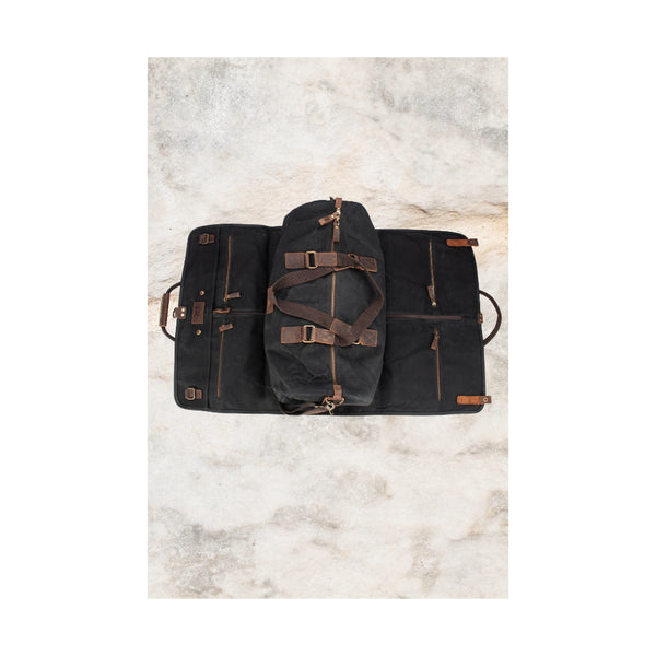 Black | Burke And Wills Foley Duffle And Suit Bag Image Showing Top View Of Duffle Bag Closed Sitting On Top Of Open Suit Bag.