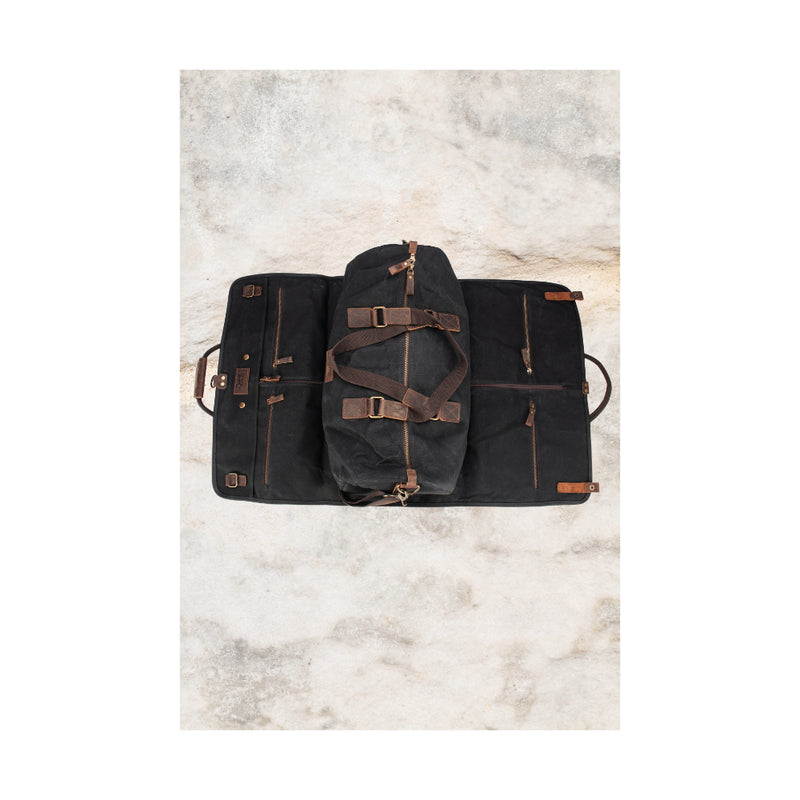 Black | Burke And Wills Foley Duffle And Suit Bag Image Showing Top View Of Duffle Bag Closed Sitting On Top Of Open Suit Bag.