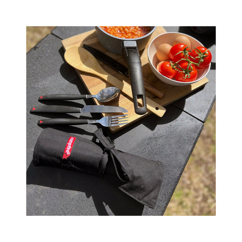 Black | Campfire 12 Piece Cutlery Set Image Showing The Set On a Bench, At Camp.