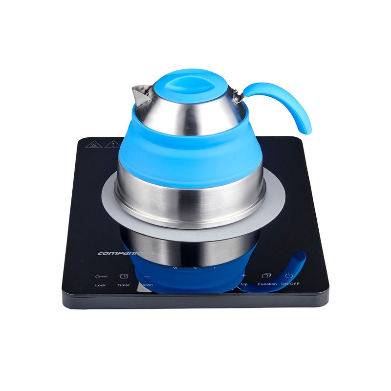Single/Black | Companion Roam Induction Cooktop Image Showing The Silicone Mate And A Kettle On The Cooktop.