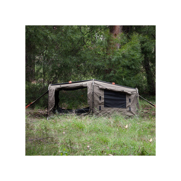 1400 / Khaki | Darche Dirty Dee Swag With 70mm Mattress Image Showing Side Very Of The Swag Set Up On A Camp Ground.