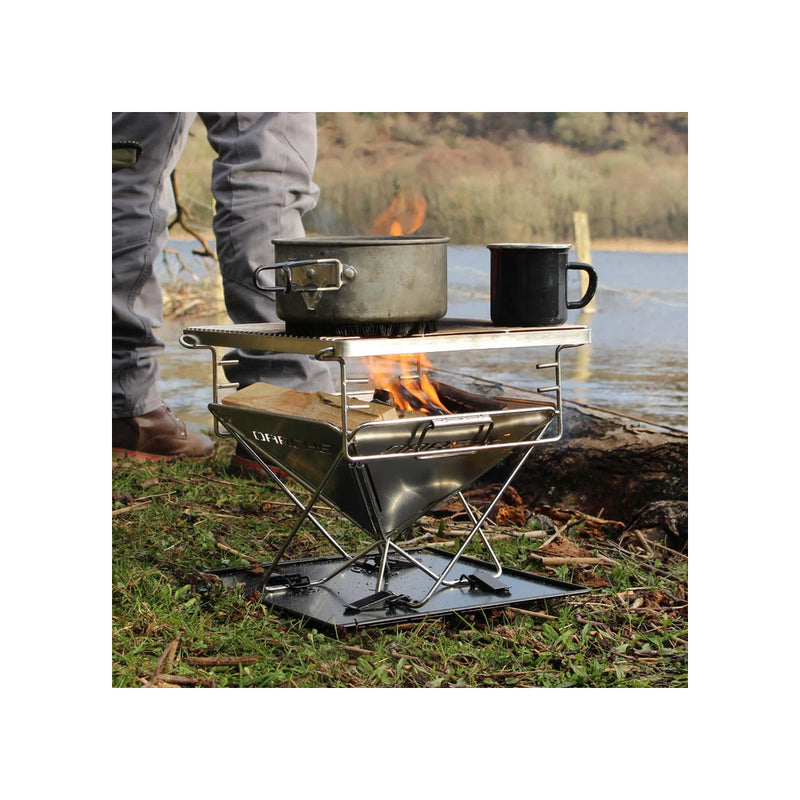 Stainless Steel | Darche Stainless Steel BBQ 310 Image Showing Food Being Cooked On The Camping BBQ, Side View.
