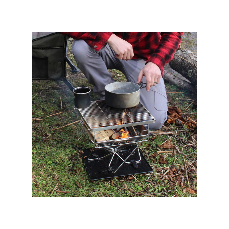 Stainless Steel | Darche Stainless Steel BBQ 310 Image Showing Food Being Cooked On The Camping BBQ, Top View.