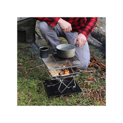 Stainless Steel | Darche Stainless Steel BBQ 310 Image Showing Food Being Cooked On The Camping BBQ, Top View.