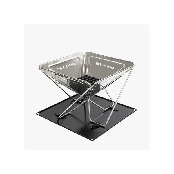 450 | Darche Stainless Steel BBQ Image Showing Angled Side View, No Grill Plate r Adjustable Height Top , Ready To Be Used As A Fire Pit.
