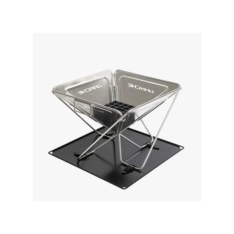 450 | Darche Stainless Steel BBQ Image Showing Angled Side View, No Grill Plate r Adjustable Height Top , Ready To Be Used As A Fire Pit.