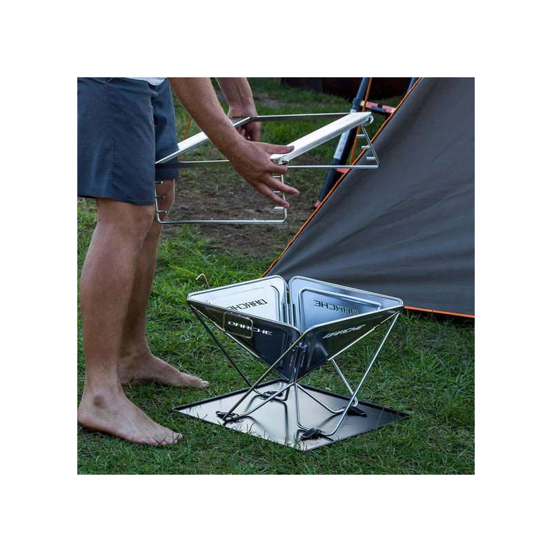 450 | Darche Stainless Steel BBQ Image Showing The Height Adjustable Plate Getting Ready To Be Put On.