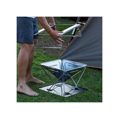 450 | Darche Stainless Steel BBQ Image Showing The Height Adjustable Plate Getting Ready To Be Put On.