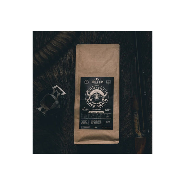 25 Pack | Dog & Gun Black Death Extra Dark Pre Loaded Drip Filters | Image Showing Bag Of Coffee Filters On A Buffalo Skin.
