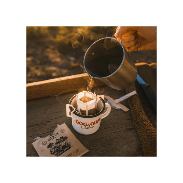 15 Pack | Dog And Gun Full Send Medium Roast Blend reloaded Drip Filters Image Showing  Boiling Water Being Poured Into The Filter.