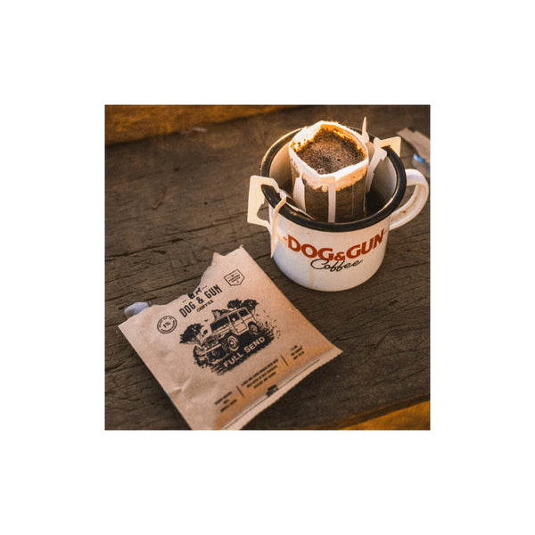 15 Pack | Dog And Gun Full Send Medium Roast Blend reloaded Drip Filters Image Showing The Coffee Filter Sitting On A Coffee Cup, After Pouring The Boiling Water.