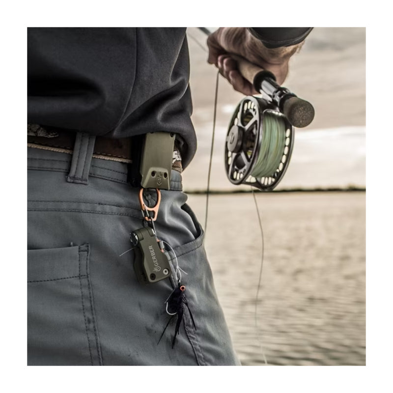 Green | Gerber Freehander Line Management Tool. Shown in Use While Fishing. 
