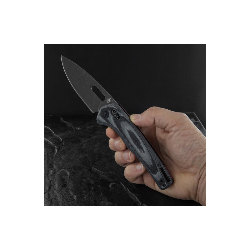 Black | Gerber Sumo Clip Folding Knife Image Showing Knife Open , Being Held In A Hand.