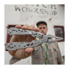 Stainless Steel | Gerber Suspension NXT Multi Tool. Shown in Hand of Tradie. 