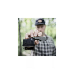 Black / Green | Gerber Tri Tip Mini Cleaver. SShowing Mini Size in Man's Hand. 