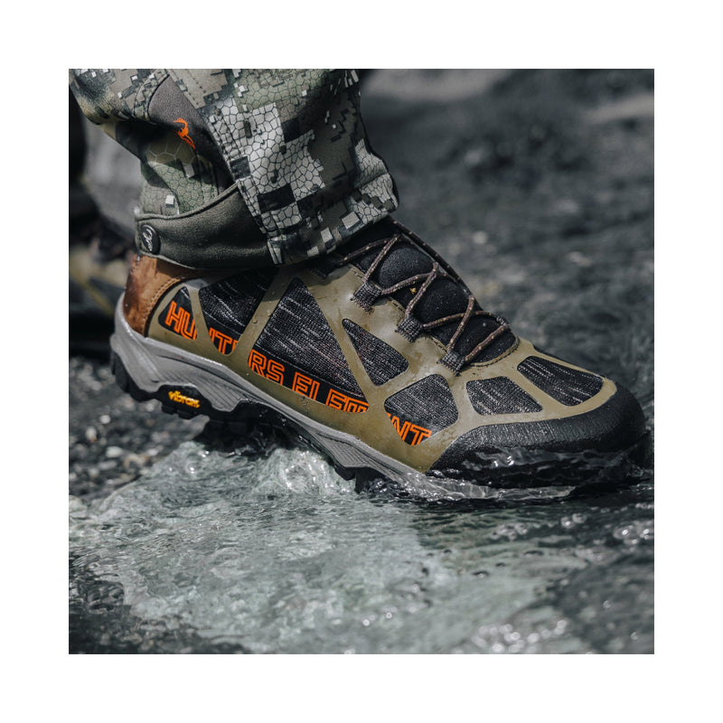 Hunters Element Prowl Boots | Image Showing Boots Being Warn While Crossing A Stream.