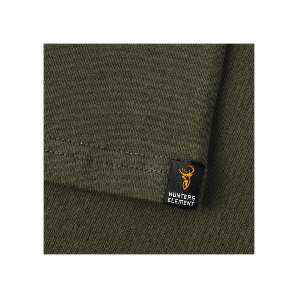 Forest Green | Hunters Element Alpha Stag Tee Image Showing Close Up View OF The Tag On The Arm Sleeve.