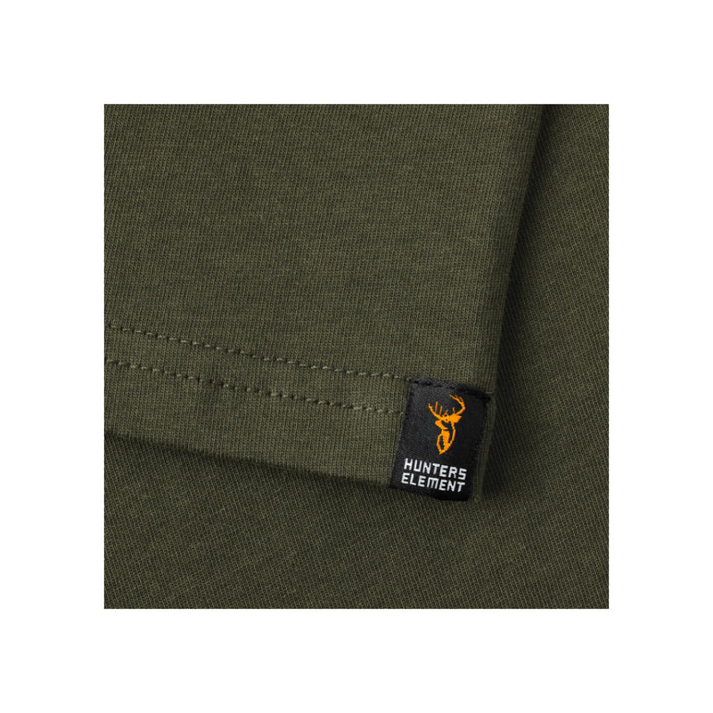 Forest Green | Hunters Element Alpha Stag Tee Image Showing Close Up View OF The Tag On The Arm Sleeve.