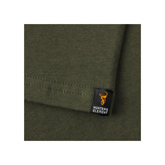 Forest Green | Hunters Element Alpha Stag Tee Image Showing Close Up View OF The Tag On The Arm Sleeve.