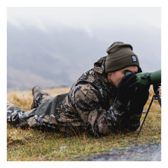 Desolve Veil Camo | Halo Jacket On Hunter Model Lying Down. 