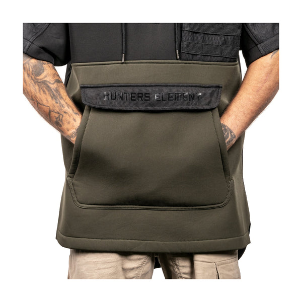 Black/Forest Green | Hunters Element Mens Tusk Bush Coat Image Showing Front View Of The Kangaroo Pocket.
