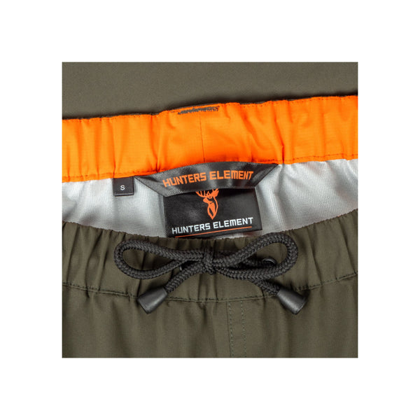 Forest Green | Hunters Element Storm Pants Image Showing Close Up View Of Tag And Waist Tie.