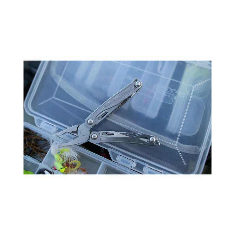 Leatherman Sidekick | Image Showing Pliers Open On Top Of A Fly Box.