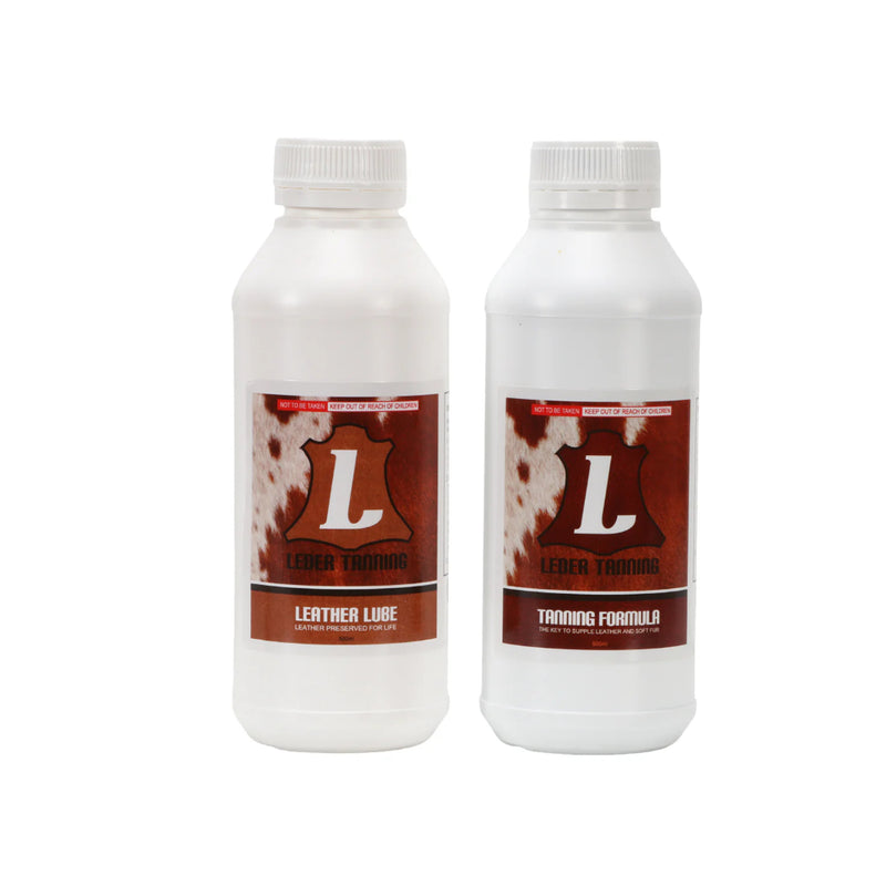 Leder Tanning Utility Kit | Image Showing Close Up Of The Leather Lube And Tanning Formula Bottles.