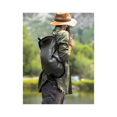Mountain Blue/8L | LifeStraw Peak Series Gravity Water Filter System Image Showing The Water Filter System Being Carried To Camp After Being Filled.
