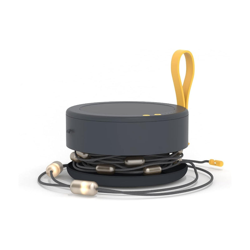 Luci Light String Light Plus | Image Displaying String Lights, Wrapped Around Power Hub. Power Hub Open With Lights On.