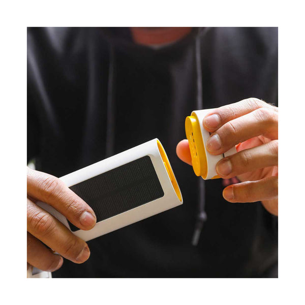 Luci-Solar HeadLamp And FlashLight | Image Showing The Light Body Being Taken Off The Solar Battery Body.