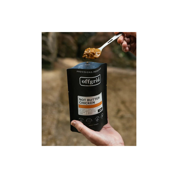 Not Butter Chicken | Off Grid Heat And Eat Meal Image Showing The Meal Being Eaten Out Of The Packaging.