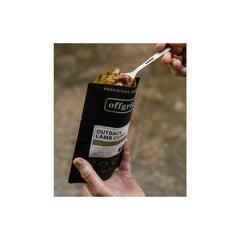 Outback Lamb Curry | Off Grid Heat Ad Eat Meals Image Showing Meal Being Eaten Out Of The Packaging.
