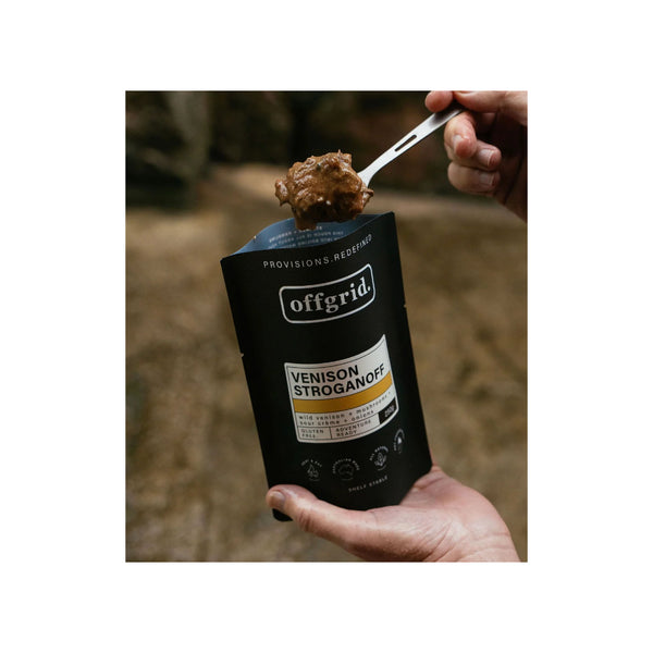 Venison Stroganoff | Off Grid Heat And Eat Meal Image Showing Product Being Eaten Out Of The Packaging.