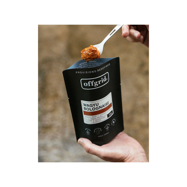 Wagyu Bolognaise | Off Grid Heat And Eat Meal Image Showing Wagyu Bolognaise Being Eat Out Of The Packaging.
