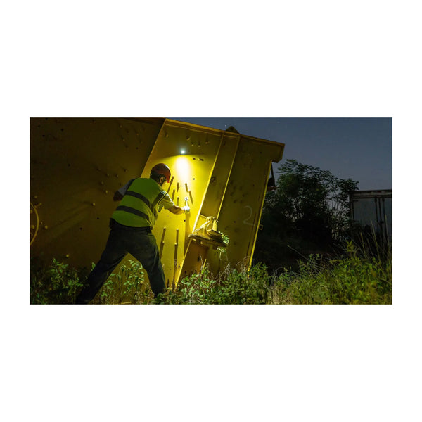 Black | Olight Perun 3 Rechargeable Headlamp 3000lms Image Showing Headlamp Being Used To Inspect Machinery.