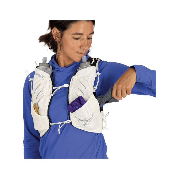 Mystery White | Osprey Duro Pro 10L Womens Hydration Vest With Flasks Image Showing The Osprey Duro Pro 10L Womens Hydration Vest With Flasks  On A Model Image Showing All Pockets With Something Hanging Out.
