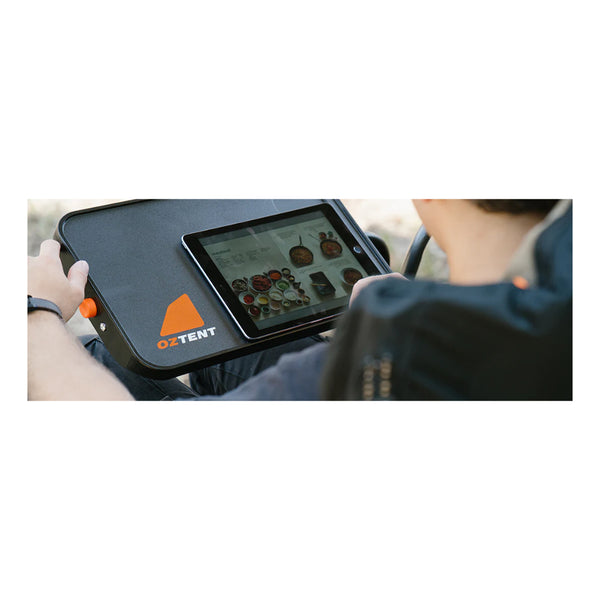 Grey | Oztent Side Table - Height and Tilt Adjustable. Shown Tilted While Using an iPad. 
