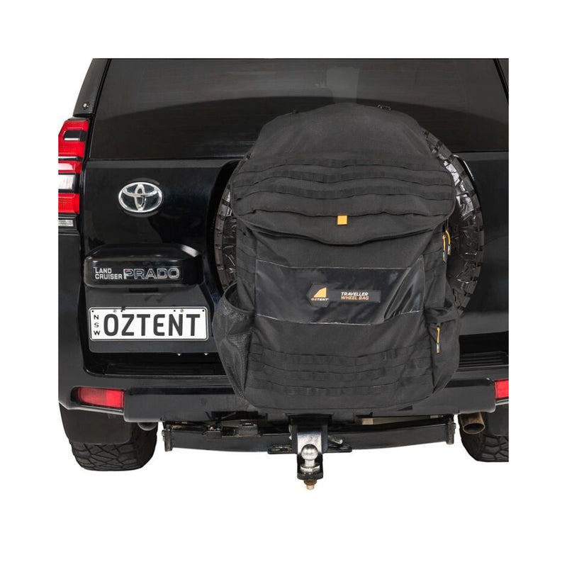 Oztent Traveller Pro Wheel Bag | Black Image Displaying Front Of Bag, Top Closed, Pockets Empty And The MOLLE System On The Body And The Top Of The Bag.