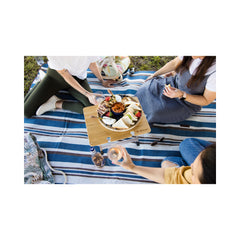 Bamboo | Oztrail Cape Series Picnic Table 43cms Image Showing Table Being Used On a Picnic Blanket.