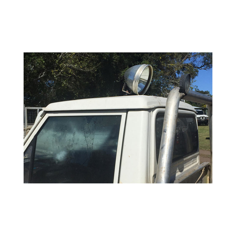 PowaBeam 245mm HID 70W 12V Spotlight With Bracket | Image Showing Spot Light Mounted On A Car Roof.