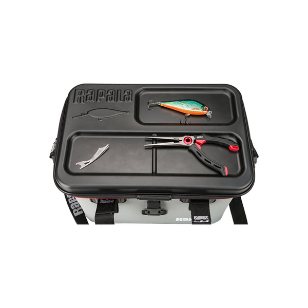 Grey / Black | Rapala Hydro Premium Tackle Bag Image Showing Top View Of The Rigid Lid , Being Used s A Bench.